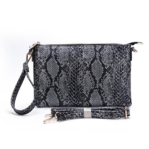 Only the Good Ivory Snakeskin Clutch