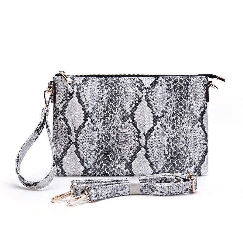 Only the Good Ivory Snakeskin Clutch