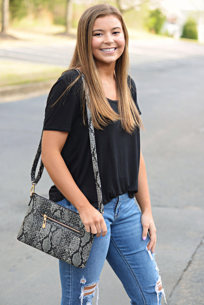 Only the Good Black Snakeskin Clutch