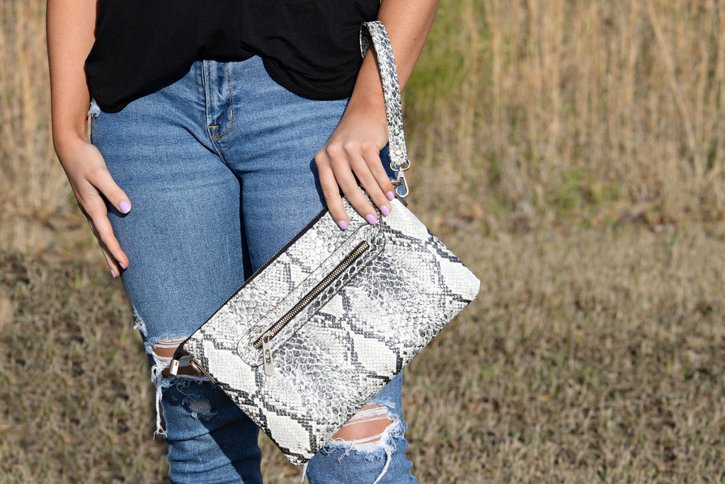 Only the Good Ivory Snakeskin Clutch